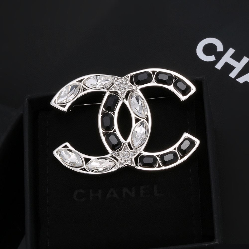 Ch*el brooches